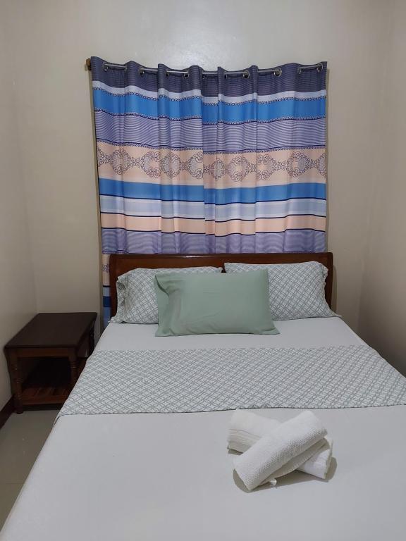 Voodi või voodid majutusasutuse Gardenview Homestay Siargao toas
