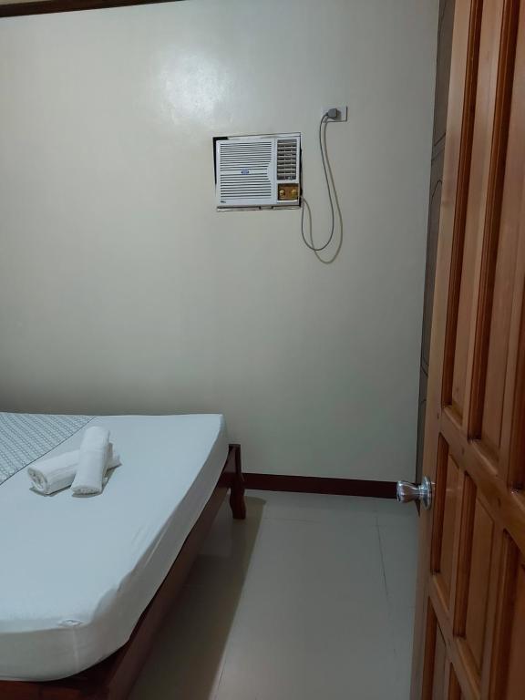 Voodi või voodid majutusasutuse Gardenview Homestay Siargao toas