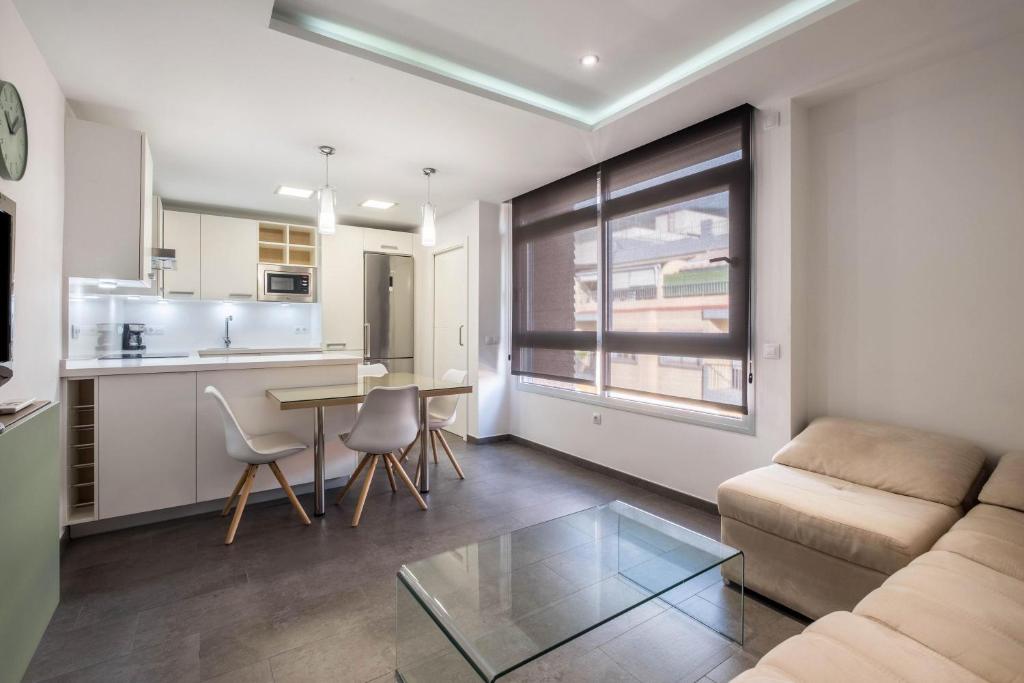 a living room with a couch and a table at Casa Tiago in Santa Cruz de Tenerife