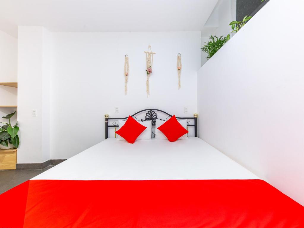 Postel nebo postele na pokoji v ubytování QA Hotel Dalat - City Centre