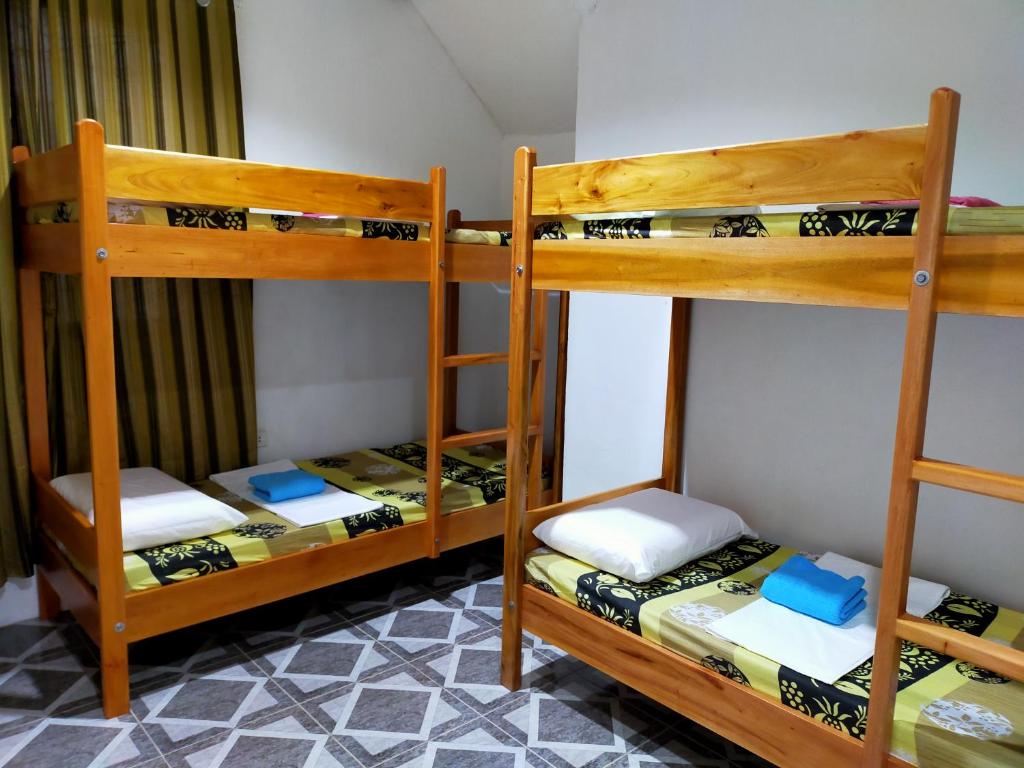 Postel nebo postele na pokoji v ubytování Pacifico Seaside Lodge