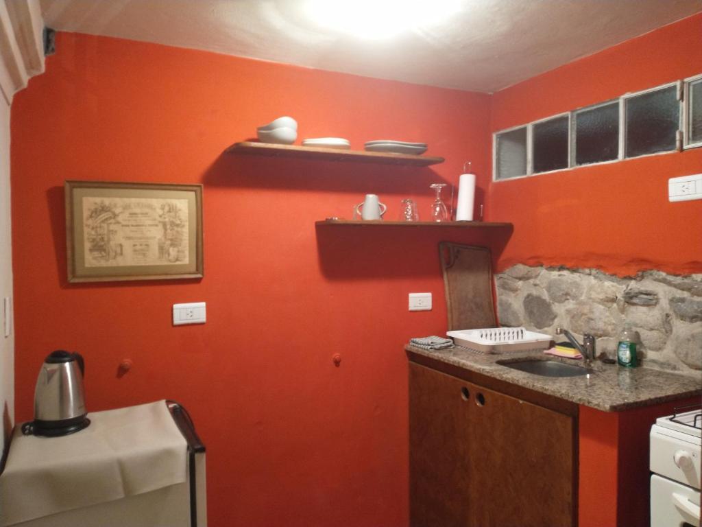 Kuchyň nebo kuchyňský kout v ubytování La Morada Aparts & Suites