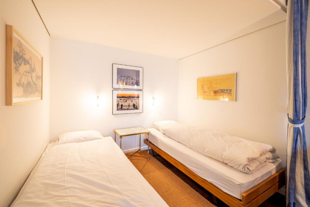 Postel nebo postele na pokoji v ubytování Residenza Quadra B223