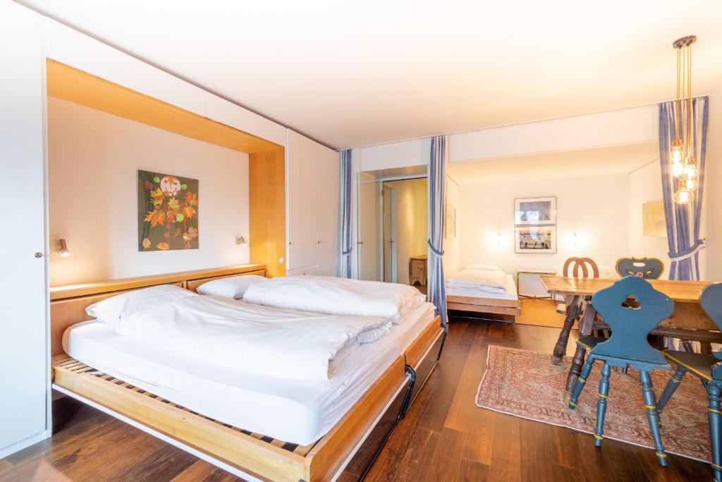 Postel nebo postele na pokoji v ubytování Residenza Quadra B223