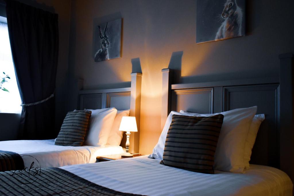 Postel nebo postele na pokoji v ubytování Pennine Manor Hotel