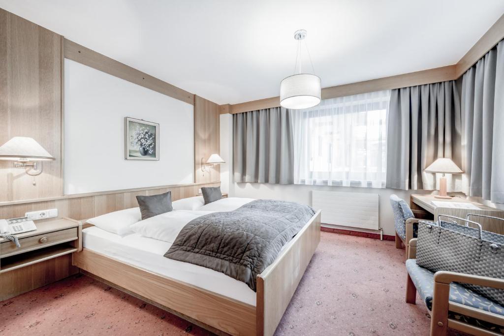 Postel nebo postele na pokoji v ubytování Hotel Sportiv by VAYA
