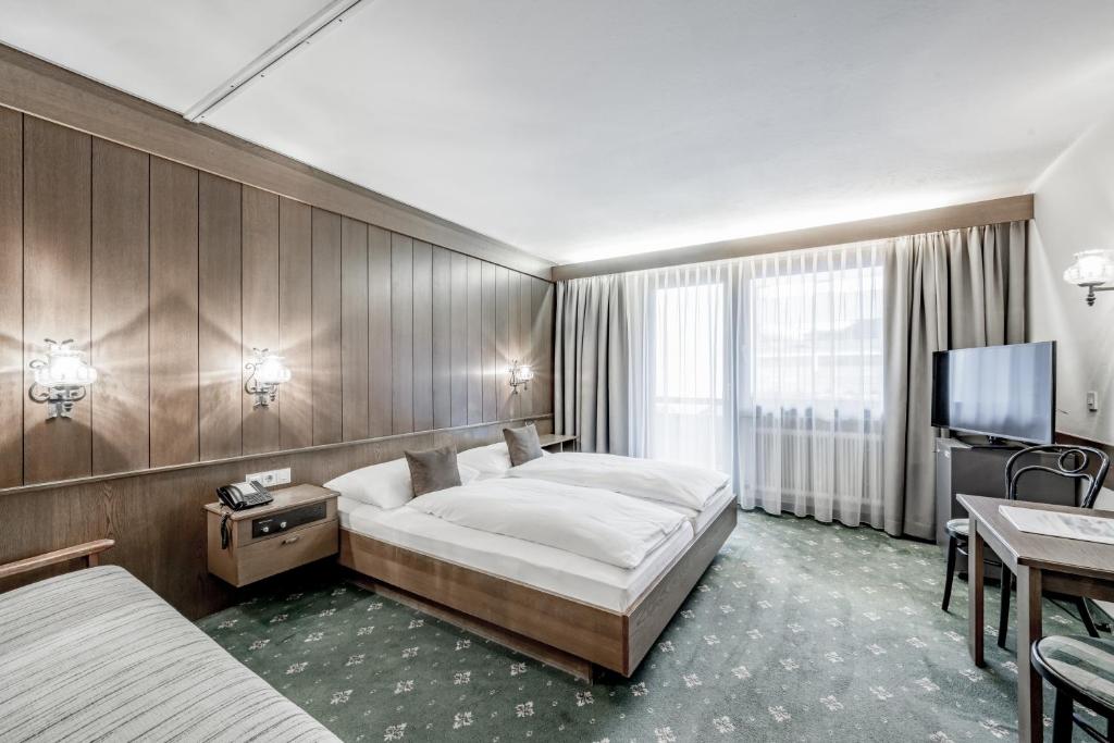 Postel nebo postele na pokoji v ubytování Hotel Sportiv by VAYA