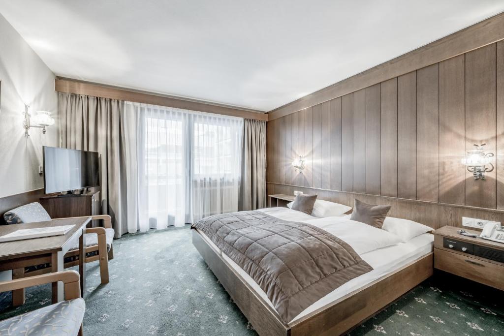 Postel nebo postele na pokoji v ubytování Hotel Sportiv by VAYA