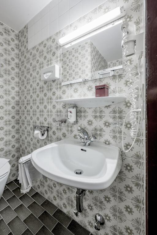 Koupelna v ubytování Hotel Sportiv by VAYA