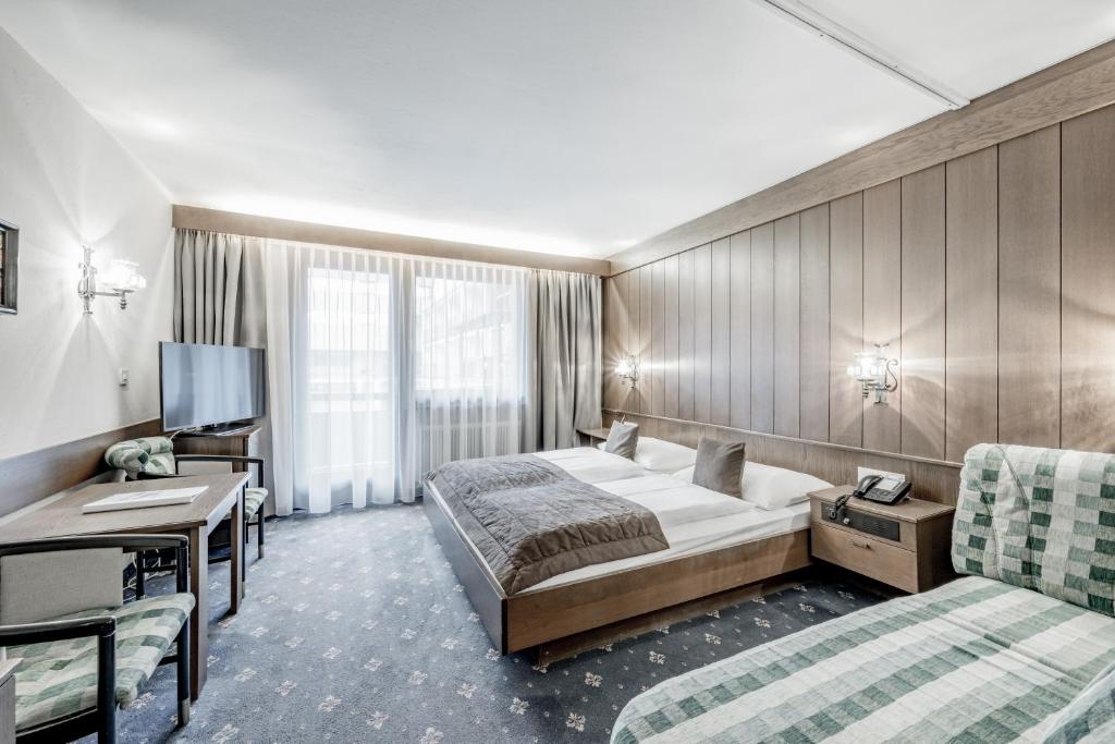 Postel nebo postele na pokoji v ubytování Hotel Sportiv by VAYA