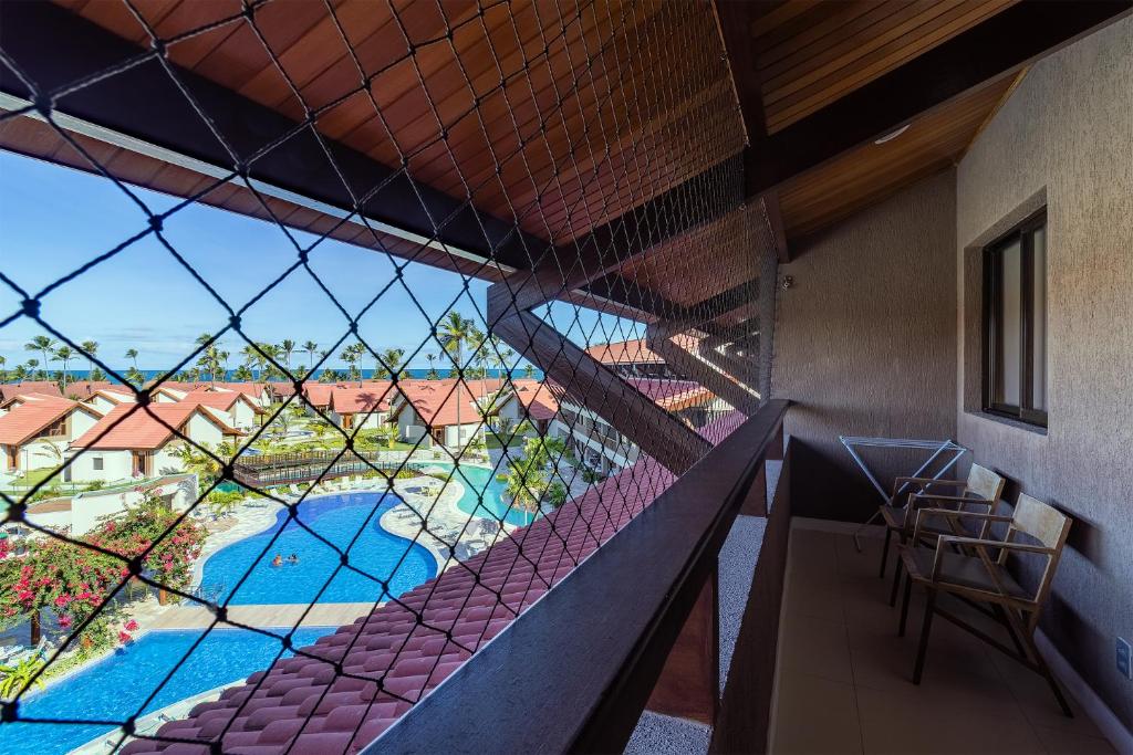  OKA Beach Resort Muro Alto Luxo por Carpediem