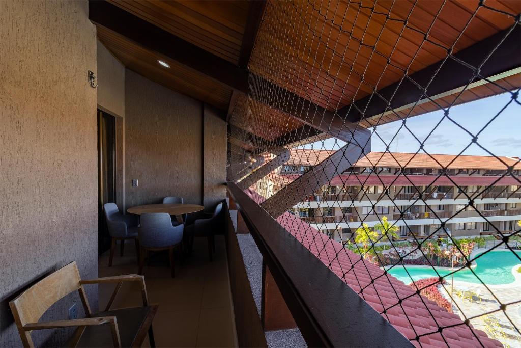  OKA Beach Resort Muro Alto Luxo por Carpediem