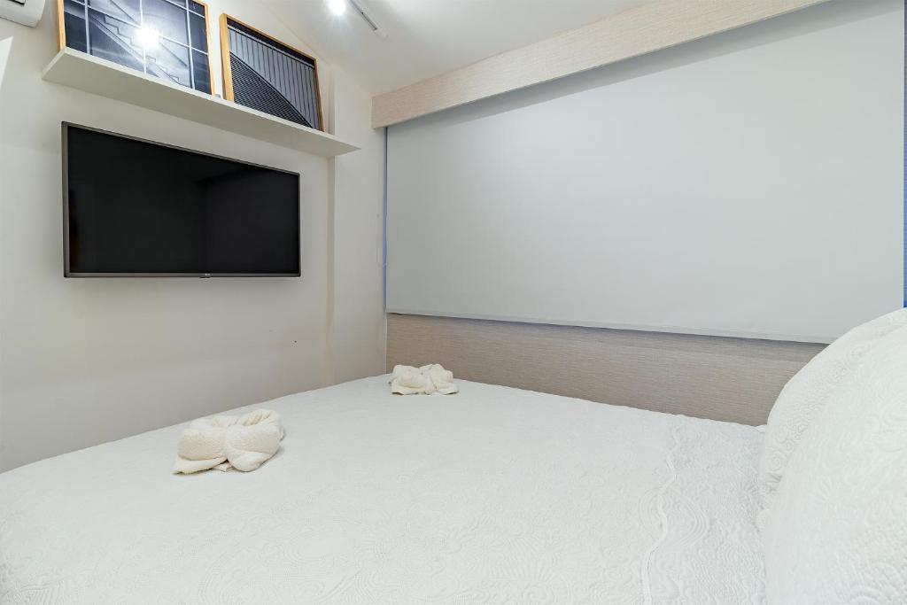  OKA Beach Resort Muro Alto Luxo por Carpediem