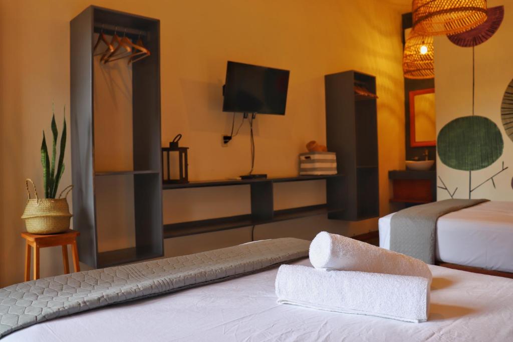 Postel nebo postele na pokoji v ubytování Hotel Sur Bacalar
