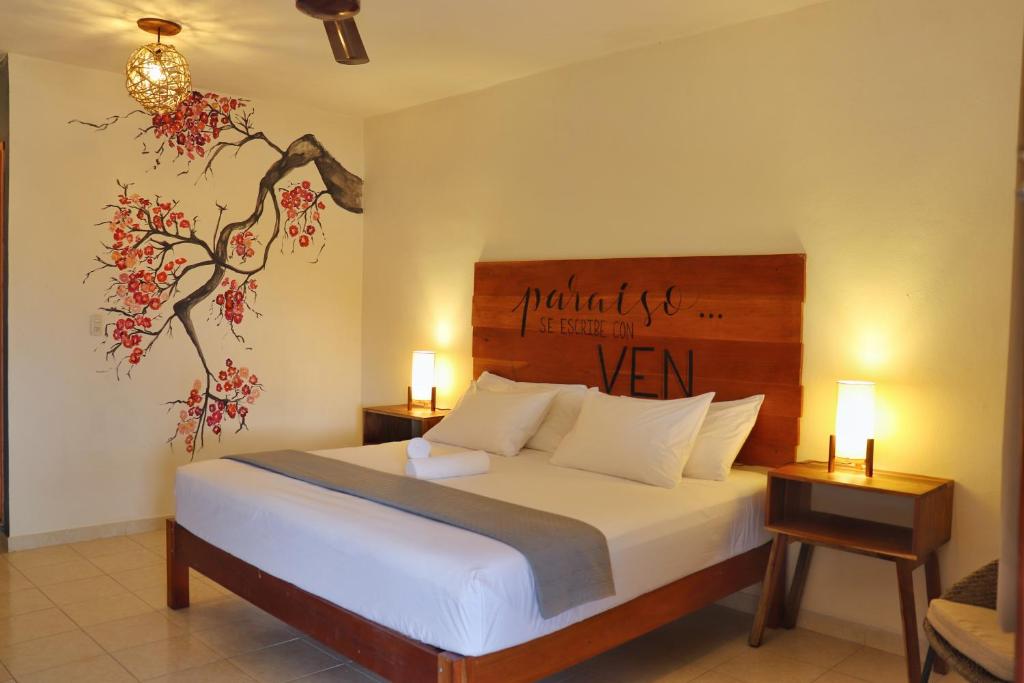 Postel nebo postele na pokoji v ubytování Hotel Sur Bacalar