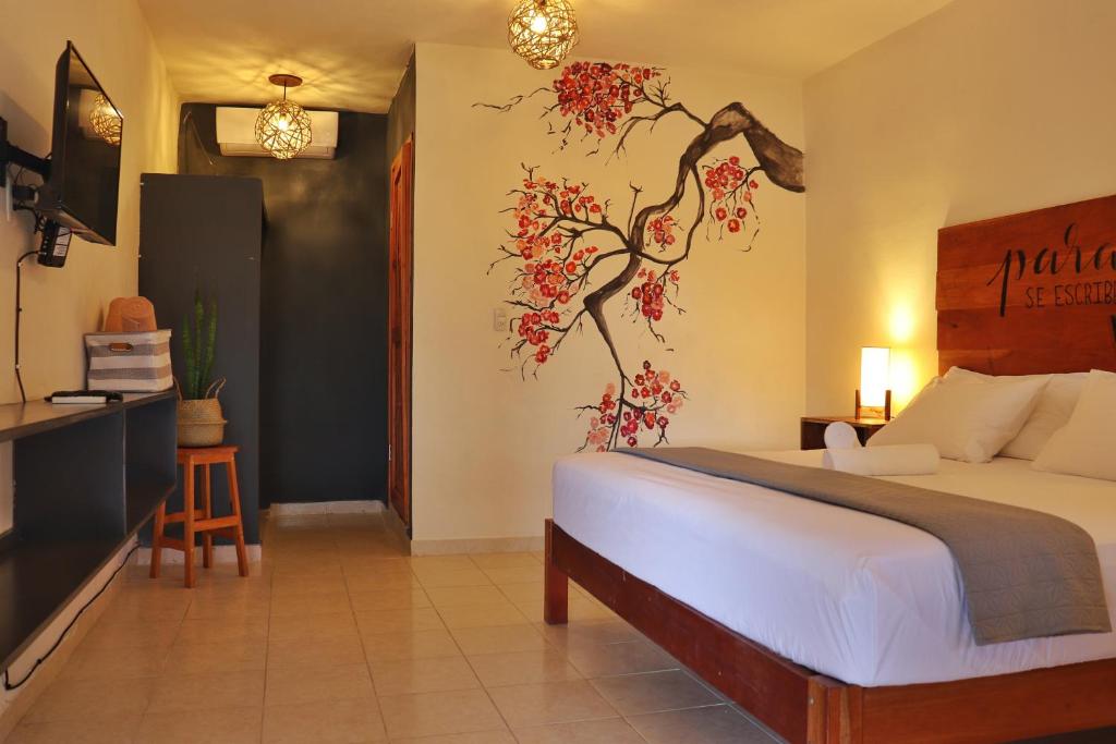 Postel nebo postele na pokoji v ubytování Hotel Sur Bacalar