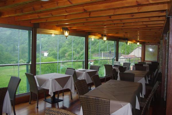 Restoran atau tempat lain untuk makan di Hostal Monte Rio