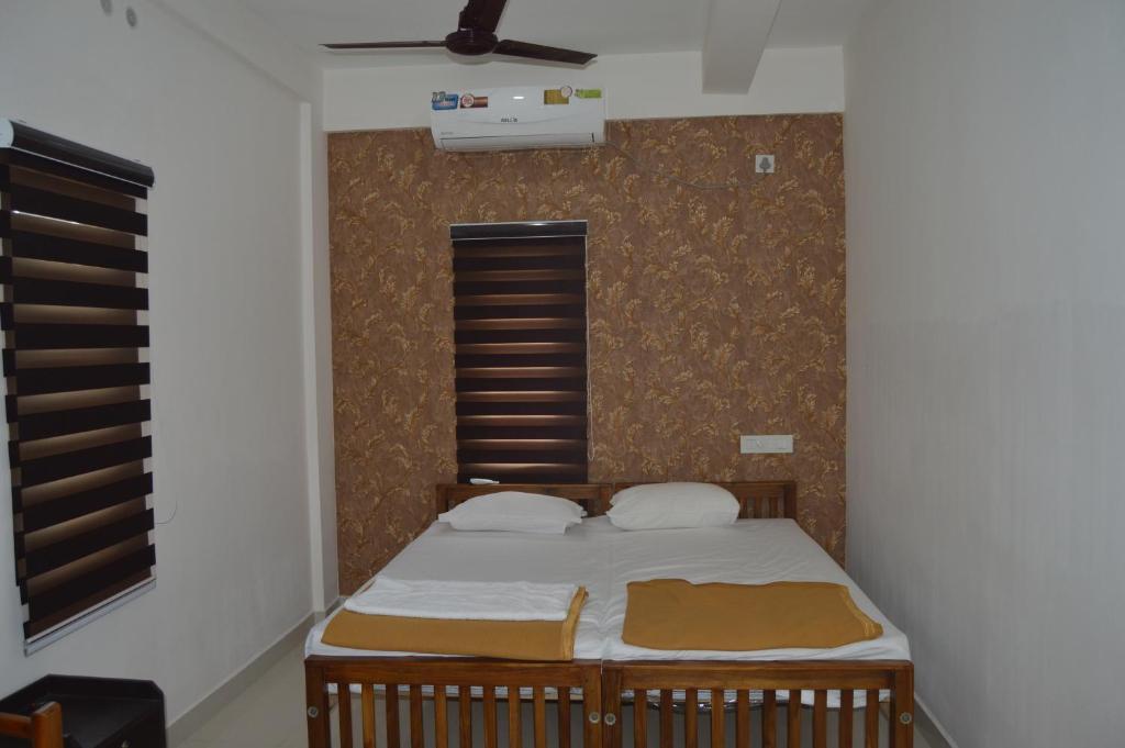 Postel nebo postele na pokoji v ubytování Coral Homes