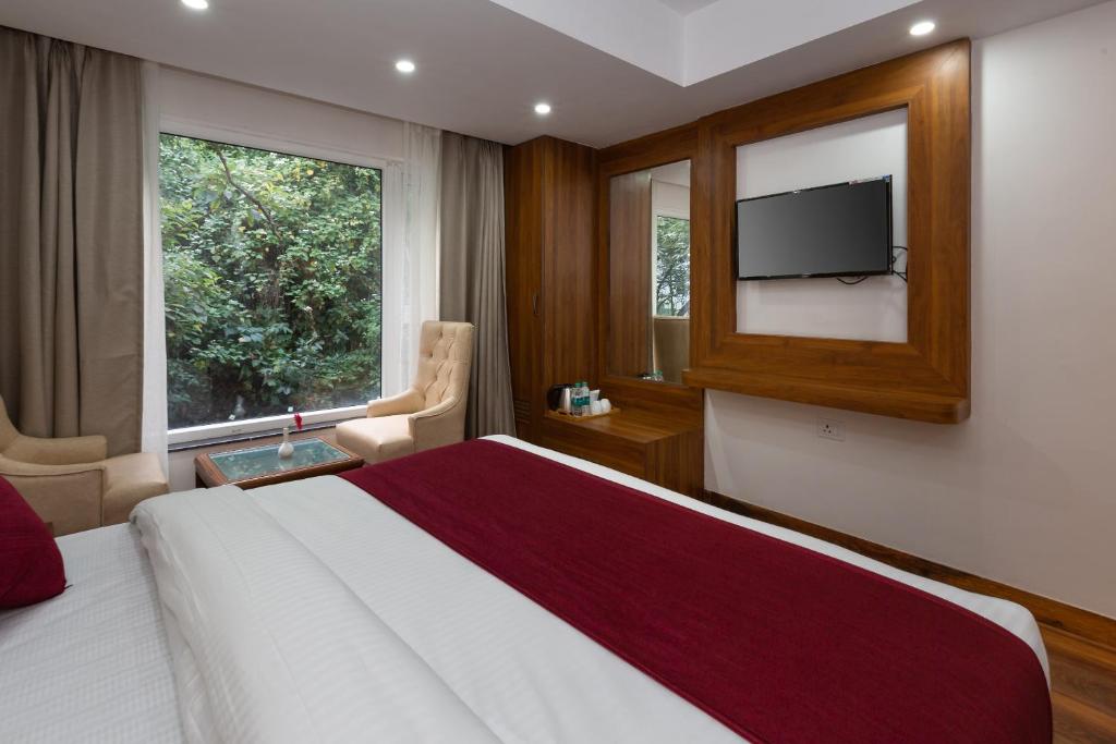TV a/nebo společenská místnost v ubytování Hotel Wild Wood