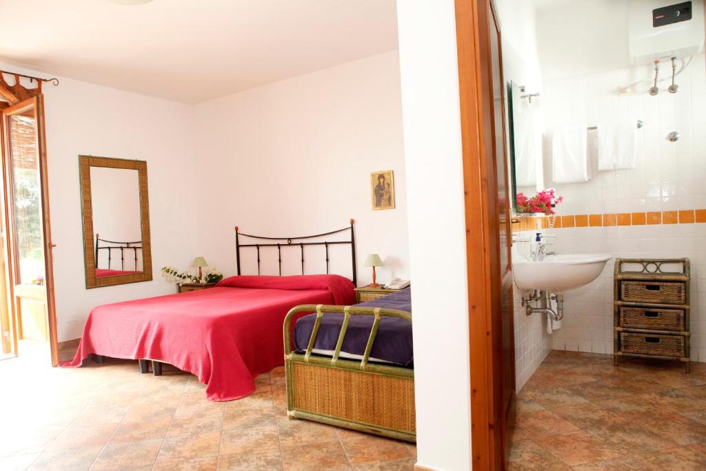 Postel nebo postele na pokoji v ubytování Residence Hotel Baia Portinenti