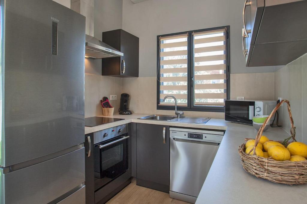 Kuchyň nebo kuchyňský kout v ubytování Casa Sol location de vacances indépendante à Calvi moins de 2km plage