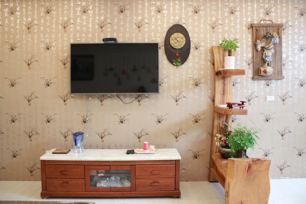 TV a/nebo společenská místnost v ubytování Wind Town Guest house
