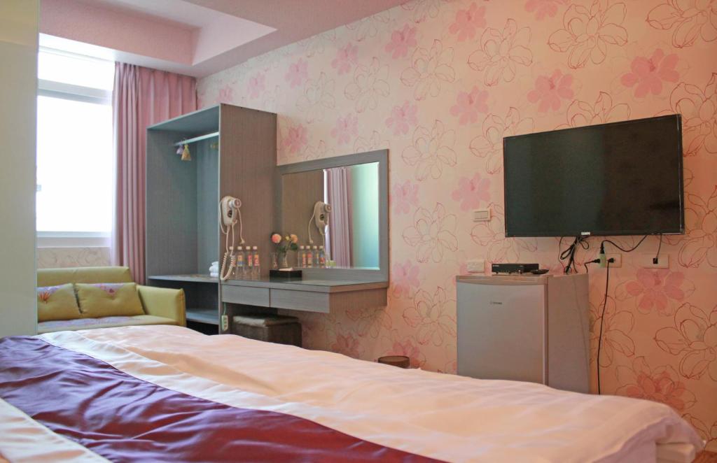 TV a/nebo společenská místnost v ubytování Wind Town Guest house