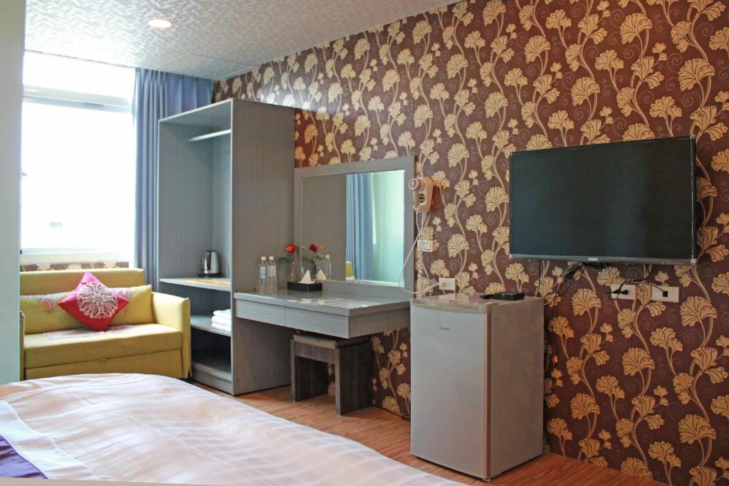 TV a/nebo společenská místnost v ubytování Wind Town Guest house