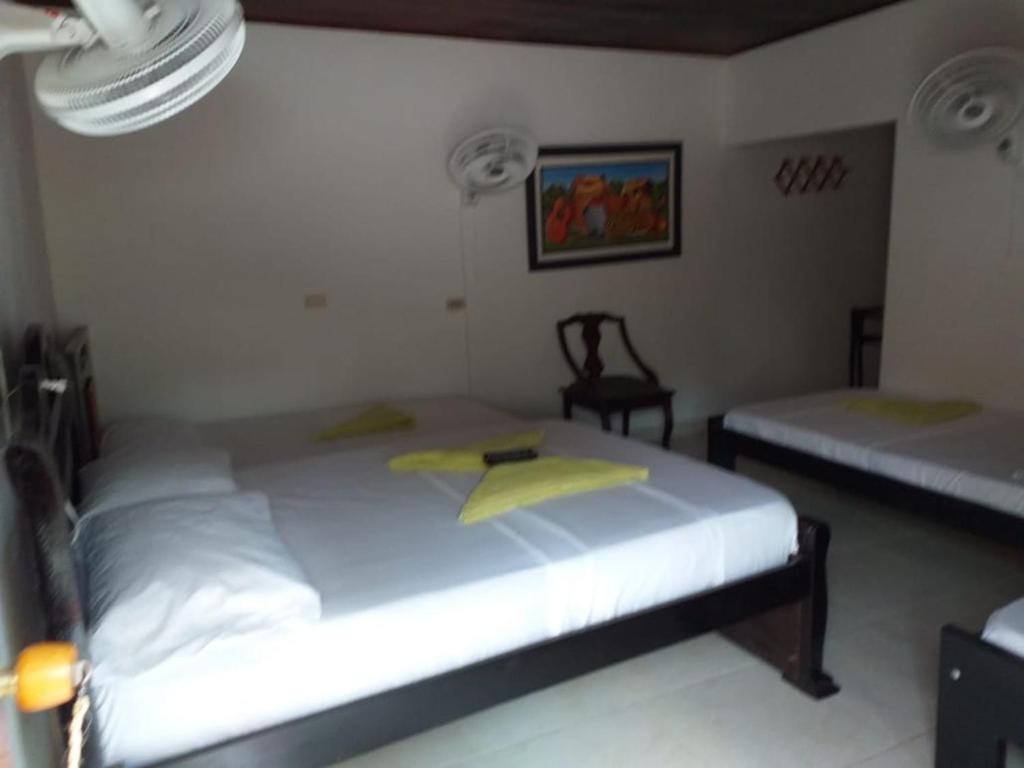 Letto o letti in una camera di Hostel Cattleya