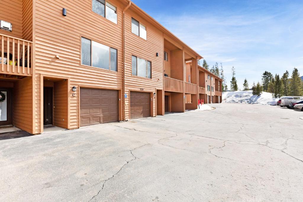 an empty parking lot in front of a building at Lagoon 737C in Frisco