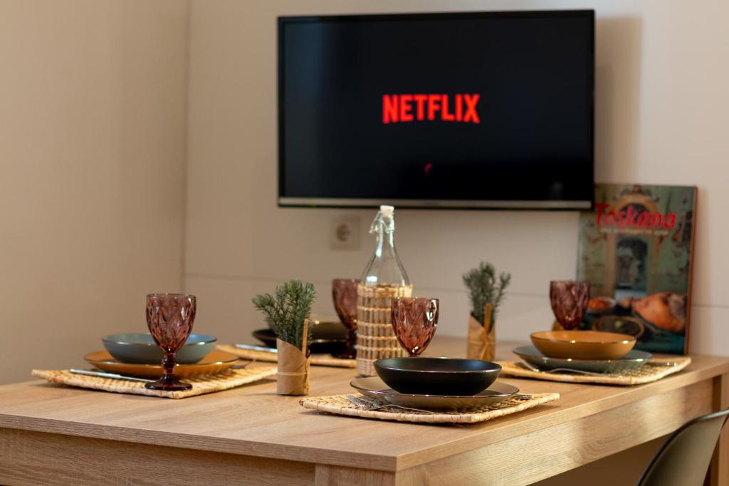 TV a/nebo společenská místnost v ubytování Apartment Haus Lang