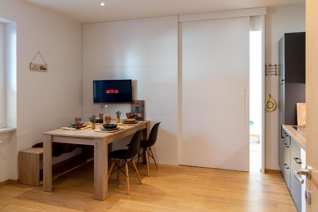 TV a/nebo společenská místnost v ubytování Apartment Haus Lang