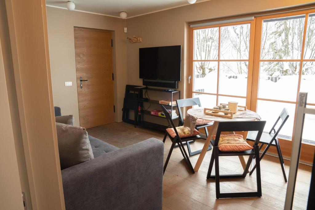 A television and/or entertainment centre at Chalet Corvara