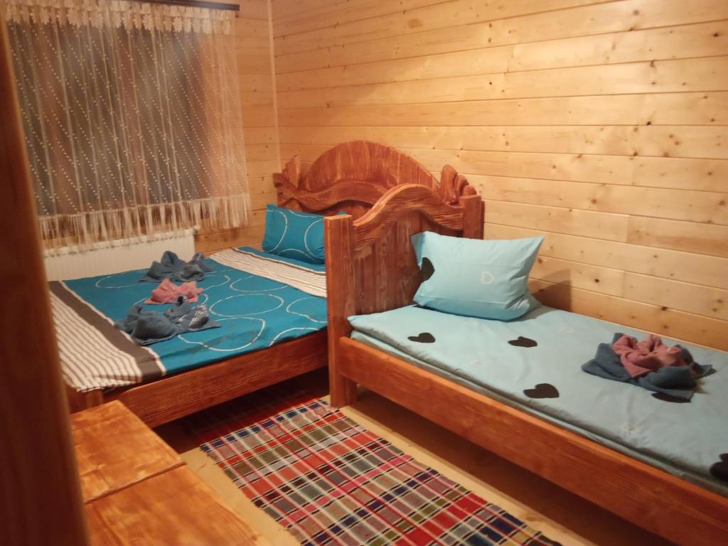 Postel nebo postele na pokoji v ubytování ''Ізківський затишок" село Ізки