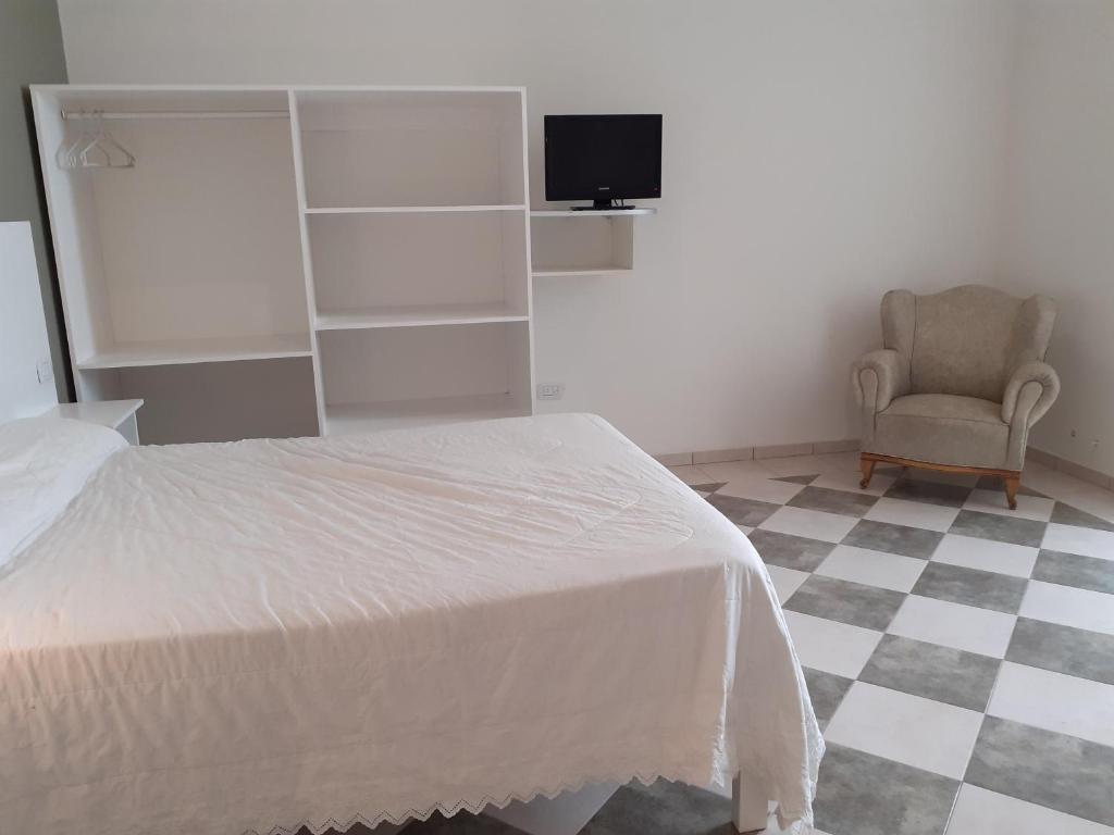 Una cama o camas en una habitación de Bello Jazmin 2