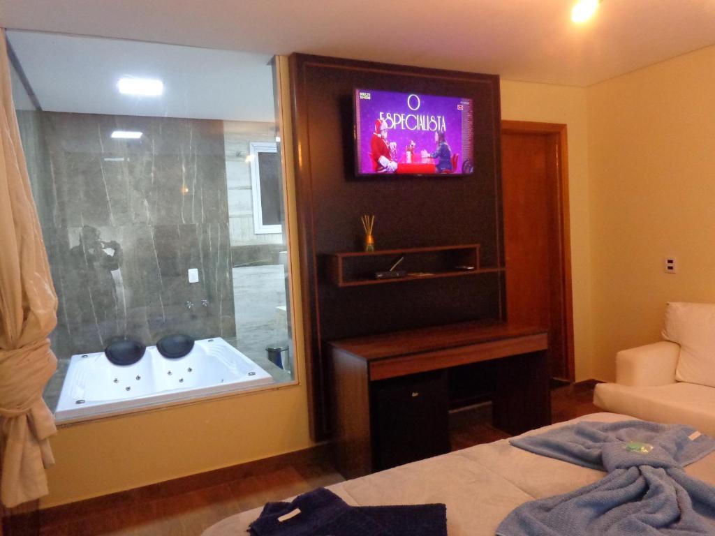  Monte Verde Inn Apartamentos&Suites com Hidromassagem dupla
