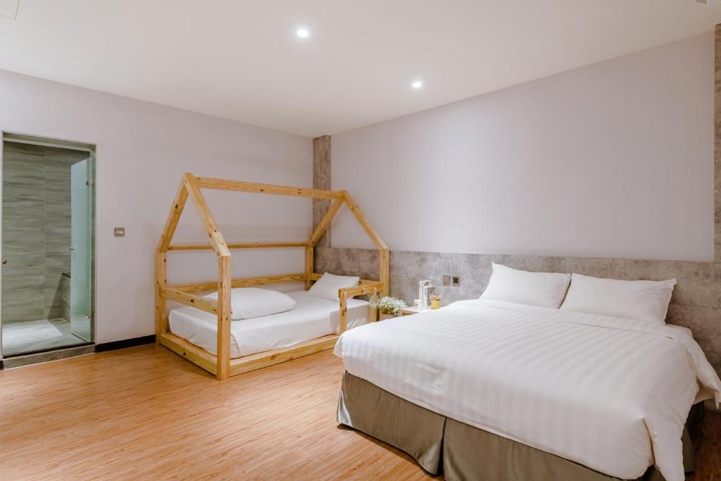 Postel nebo postele na pokoji v ubytování Prince Hotel