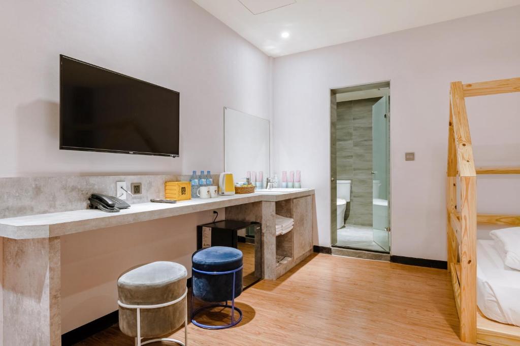 Postel nebo postele na pokoji v ubytování Prince Hotel