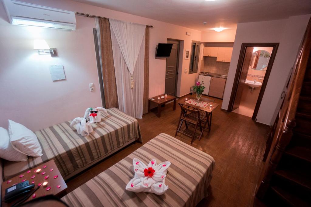 Posteľ alebo postele v izbe v ubytovaní Flamingos Hotel Apartments