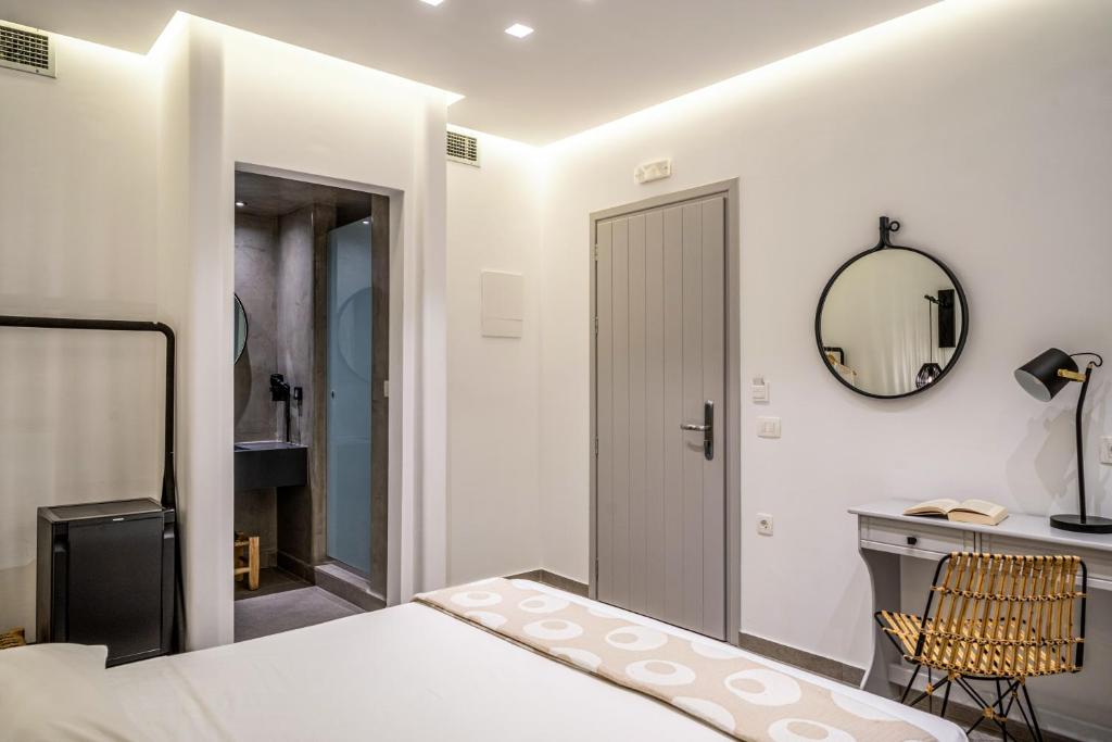Voodi või voodid majutusasutuse Hippocampus Hotel toas