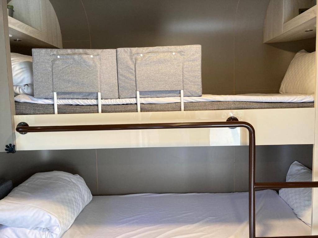 Postel nebo postele na pokoji v ubytování Notting Hill B&B