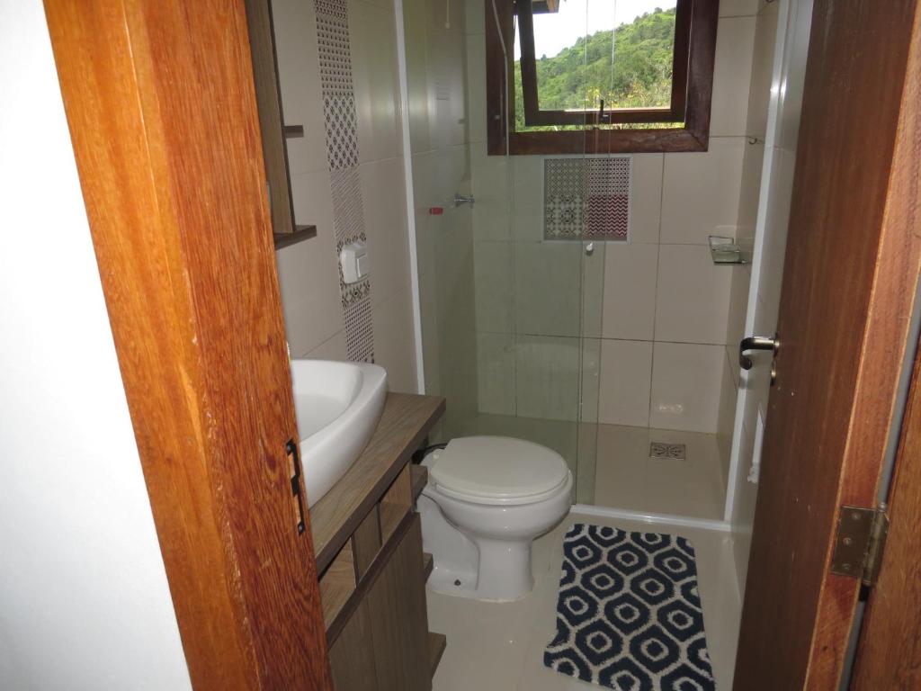  Casa com trilha pra praia e linda vista para Lagoa da Conceição