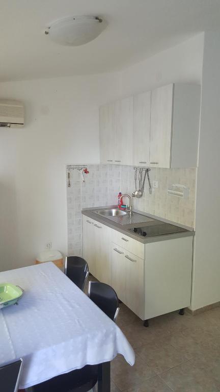 Kuchyňa alebo kuchynka v ubytovaní Apartment Viktor