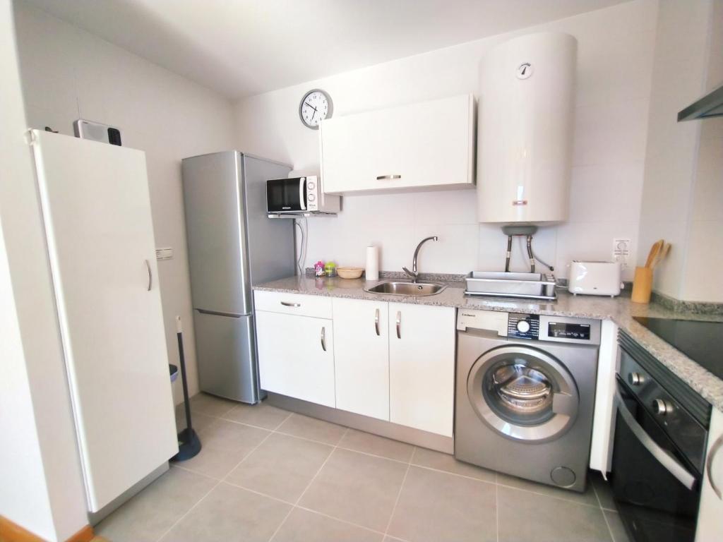 Una cocina o zona de cocina en Portbeach