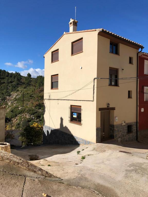a house on the side of a mountain at CASA RURAL FUENTE LA REINA Ref 045 in Fuente la Reina