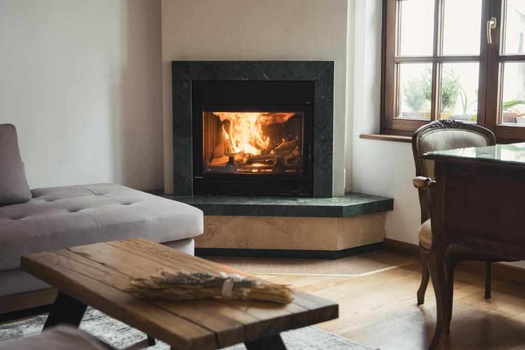 Posezení v ubytování Four Season Maison