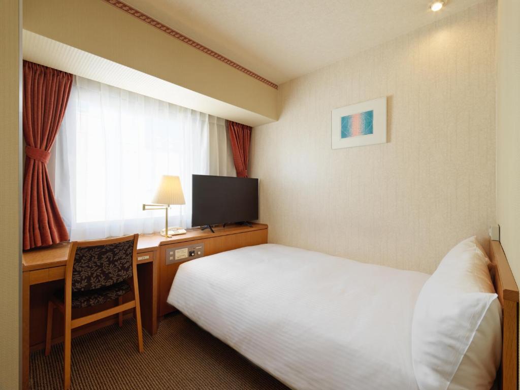 TV a/nebo společenská místnost v ubytování Hotel Emisia Tokyo Tachikawa