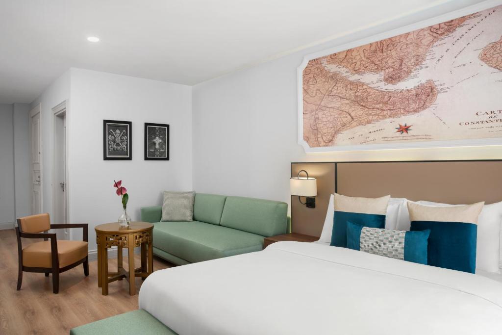 Postel nebo postele na pokoji v ubytování Akka Suites Taksim-Special Class