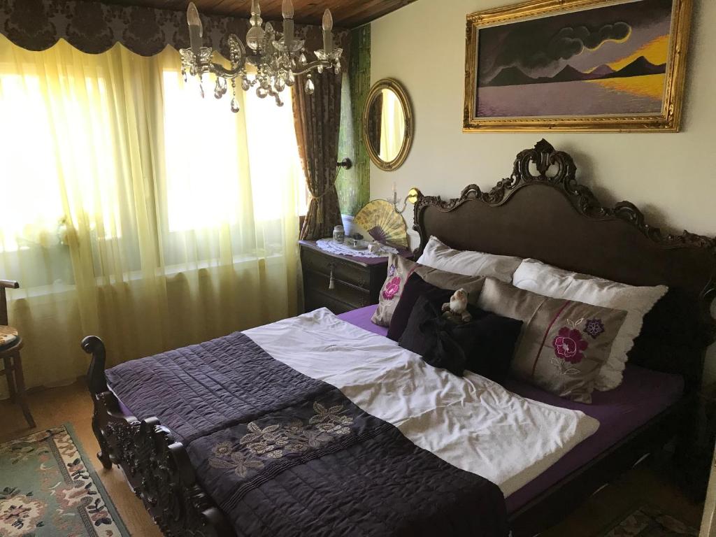 Ένα ή περισσότερα κρεβάτια σε δωμάτιο στο Nyaraló Japánkerttel - Apartment with Japanese Garden