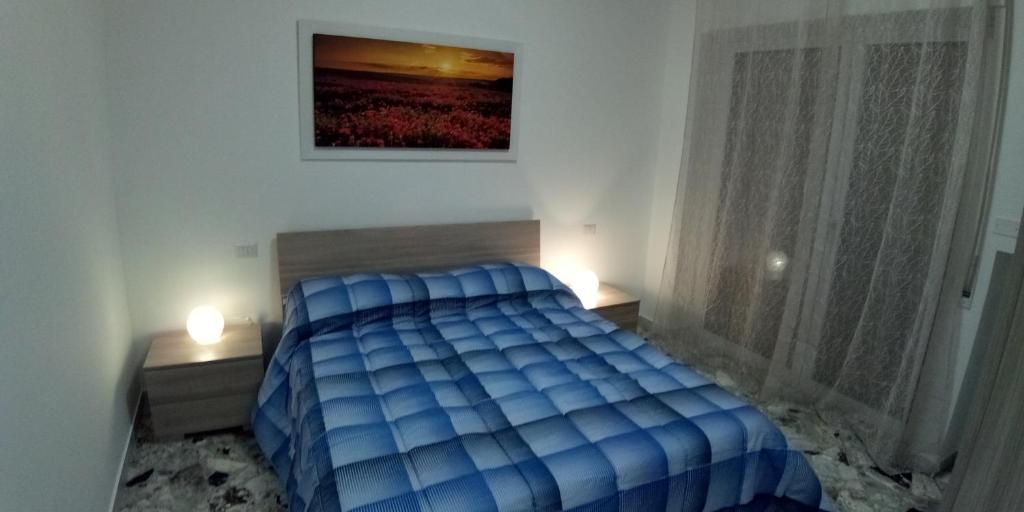 Posteľ alebo postele v izbe v ubytovaní Station suite